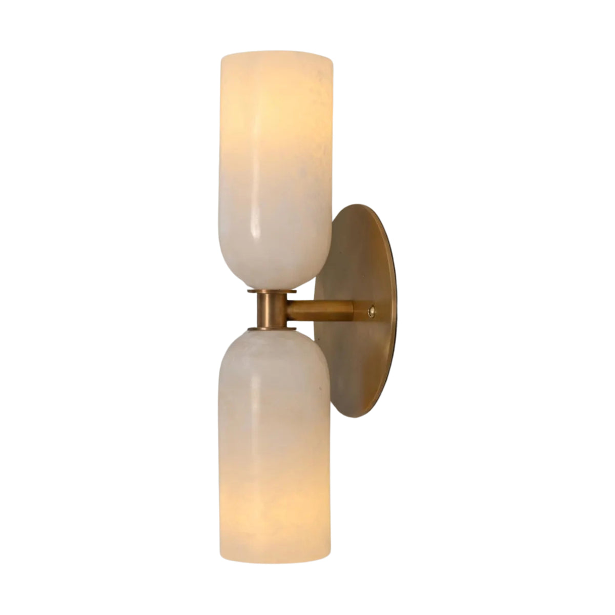Illuminated front view of the Sloane Double Cylinder Alabaster Wall Sconce showcasing the soft glow and unique natural alabaster veining.