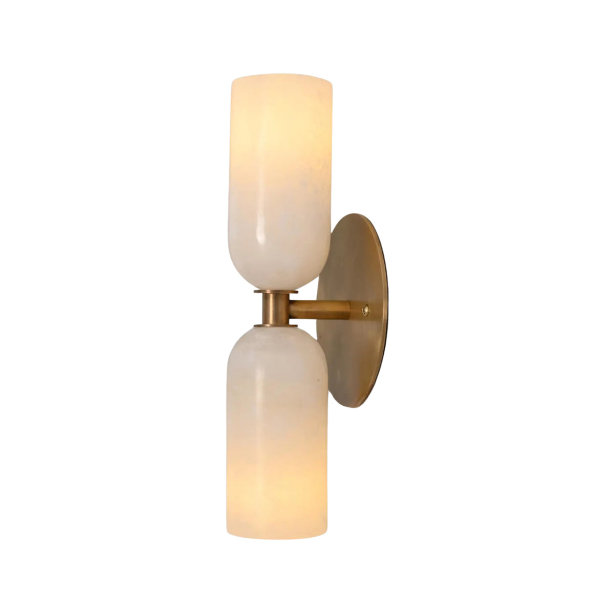 Front illuminated view of the Sloane Double Cylinder Alabaster Wall Sconce in solid brass featuring handcrafted natural alabaster cylinder shades.