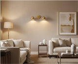 Sloane double dome wall light featuring brass finish, linear arm and rounded metal shades – Model 32811