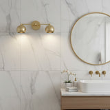 Sloane 2 light double dome wall sconce in brass tone shown from left angled view – Model 32811