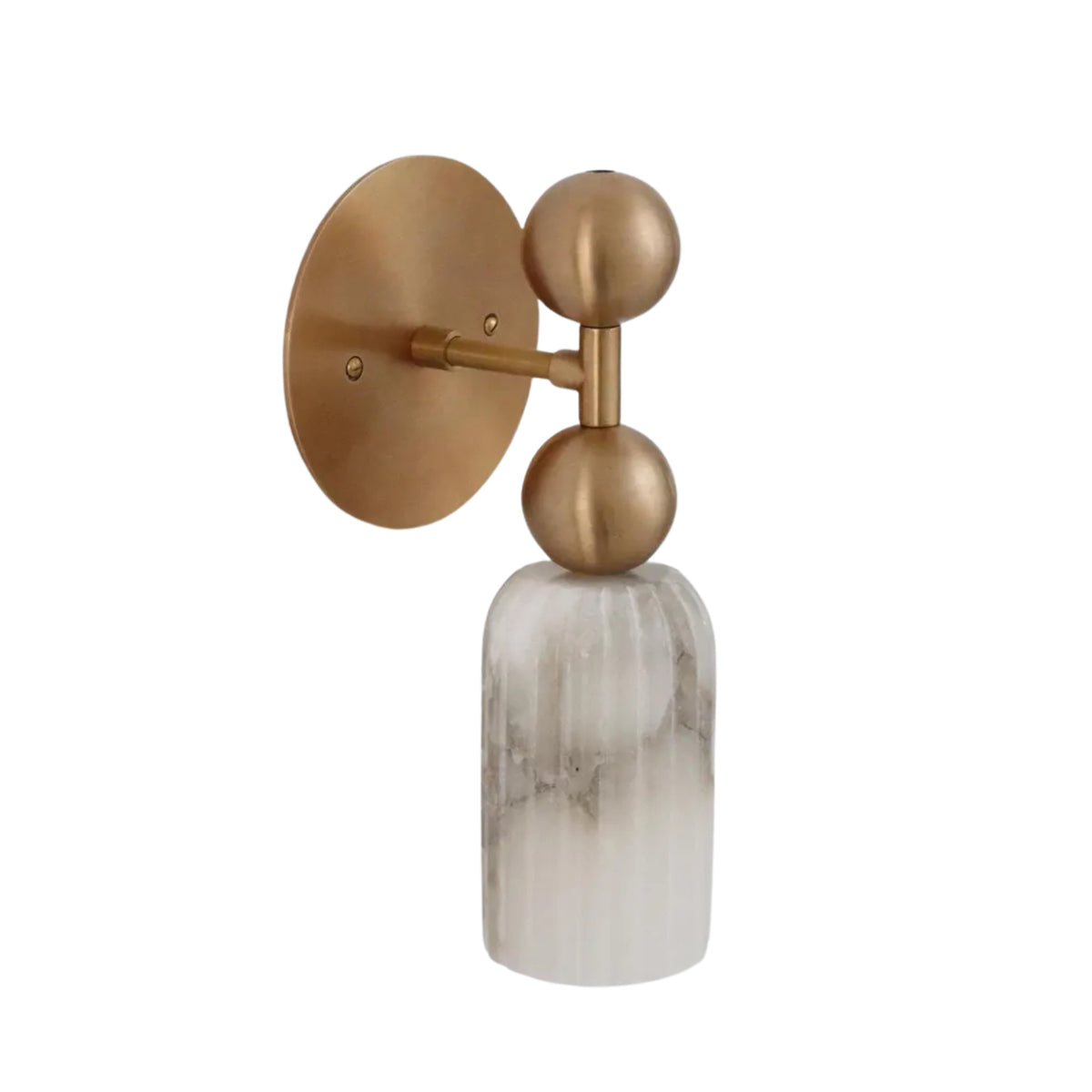 Angled front view of the Sloane Fluted Alabaster Wall Sconce featuring a handcrafted fluted alabaster cylinder shade, decorative double brass globe accents, and round brass backplate.