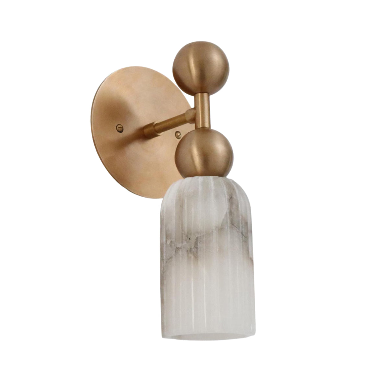 Side perspective of the Sloane Fluted Alabaster Wall Sconce featuring handcrafted alabaster stone, solid brass construction, and elegant double globe design.