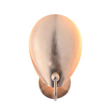 Front view of the illuminated Sloane Modern Oval Shield Wall Sconce showcasing soft indirect ambient lighting reflected around the handcrafted oval metal shield.