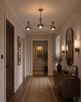 Soho 3 light brass dome chandelier illuminating a refined hallway with warm wood furniture and neutral contemporary decor.
