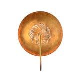 Front illuminated view of Solara halo glass disc wall sconce with warm circular glow and textured glass center.