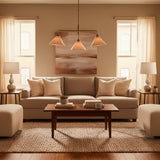 Sorrento 3 light brass chandelier shown from the front with three natural linen tapered cone shades and sculptural arms.