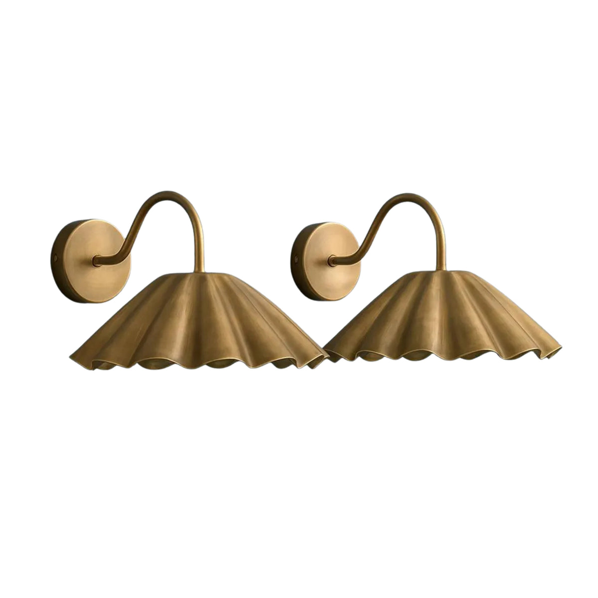 Front angled view of a matching pair of handcrafted brass pleated dome wall sconces with elegant curved wall arms.