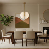Stockholm 4 light white metal split dome chandelier shown illuminated from the front with a brass frame.