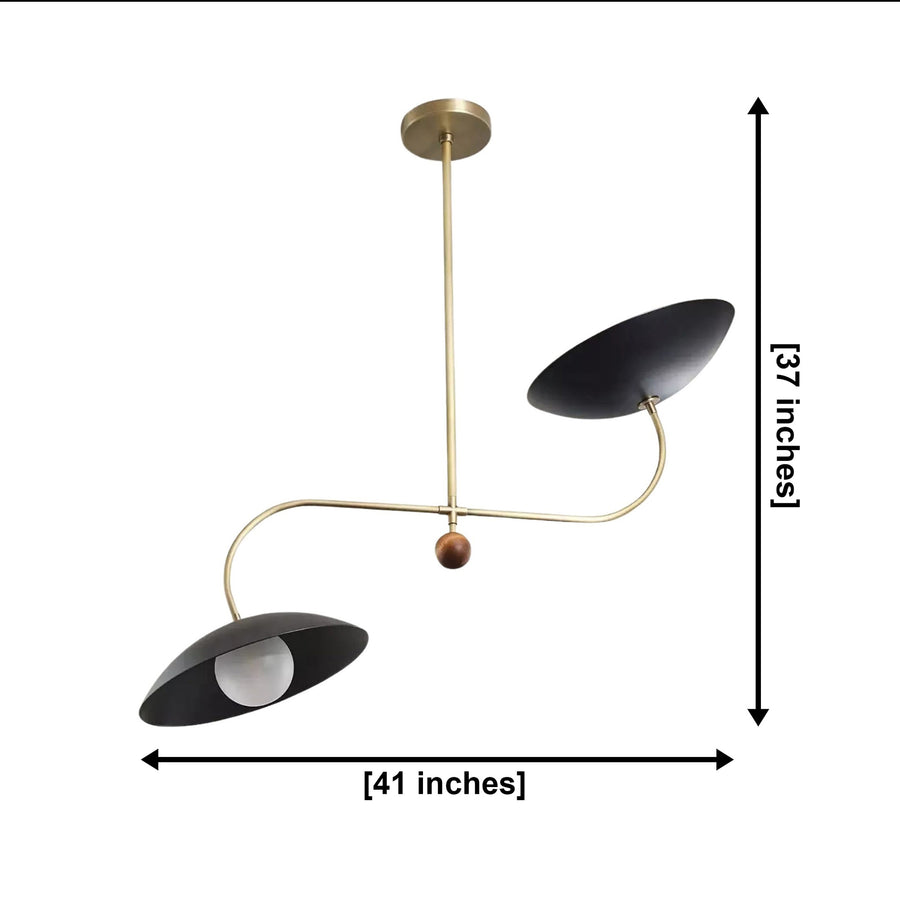 Strasbourg 2 light black disc chandelier installed above a round dining table in a warm Mid-Century Modern dining room.