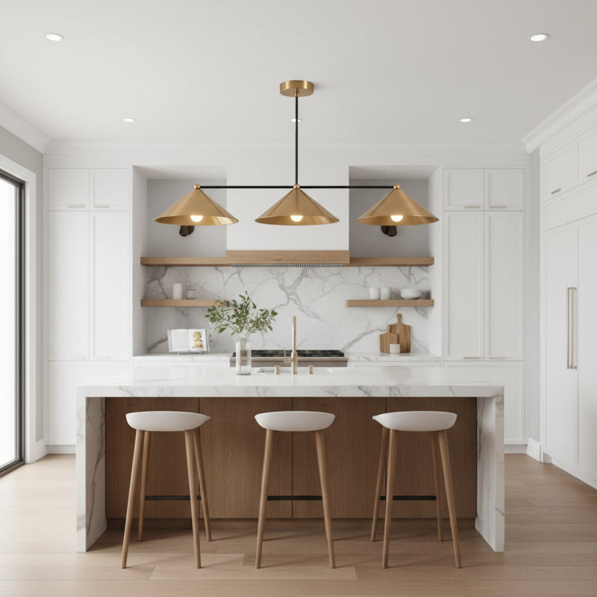 Front view of Sutton 3 light linear chandelier with wide brass cone shades and contrasting dark frame