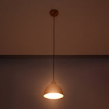 Sutton hammered copper mini dome pendant light providing bright downward illumination through its handcrafted hammered copper shade.