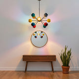 Tallinn 12 light multicolor Sputnik chandelier shown from an angled view highlighting its radial arms and colorful shades.