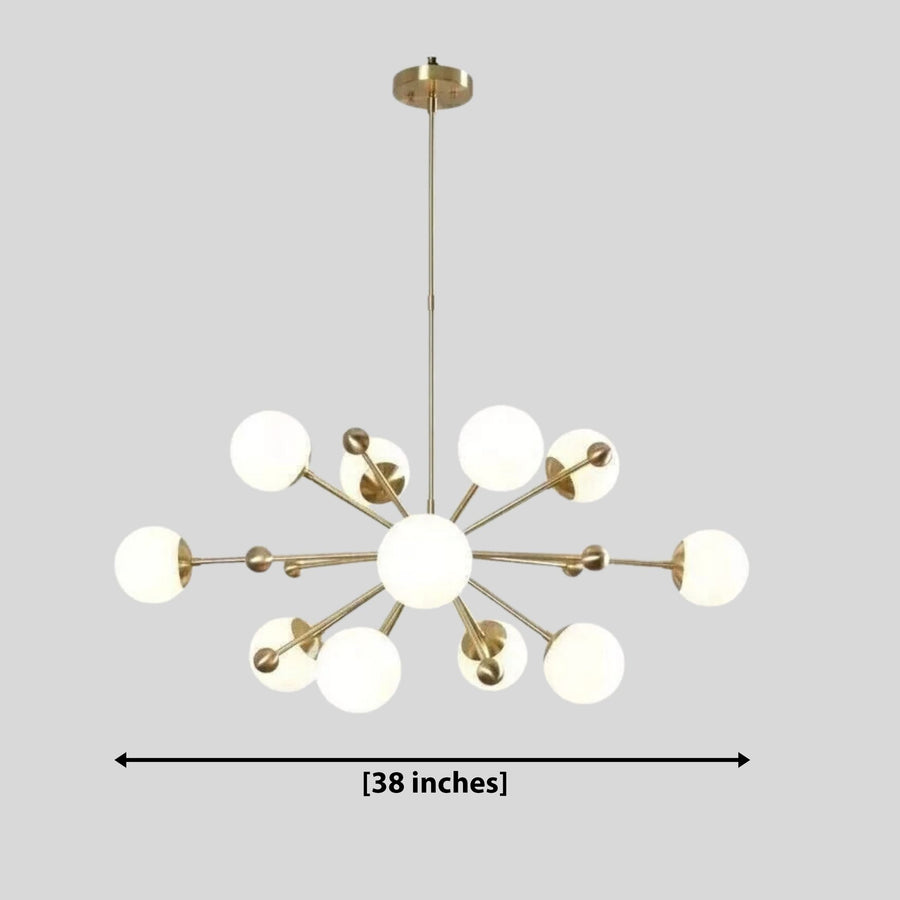 Tallinn 12 light brass-tone globe chandelier illuminating a refined living room with warm wood furniture and Mid-Century Modern styling.