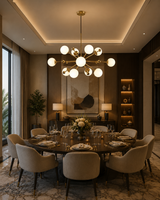 Tallinn 12 light sculptural globe chandelier displayed above a large dining table in a sophisticated contemporary dining room.