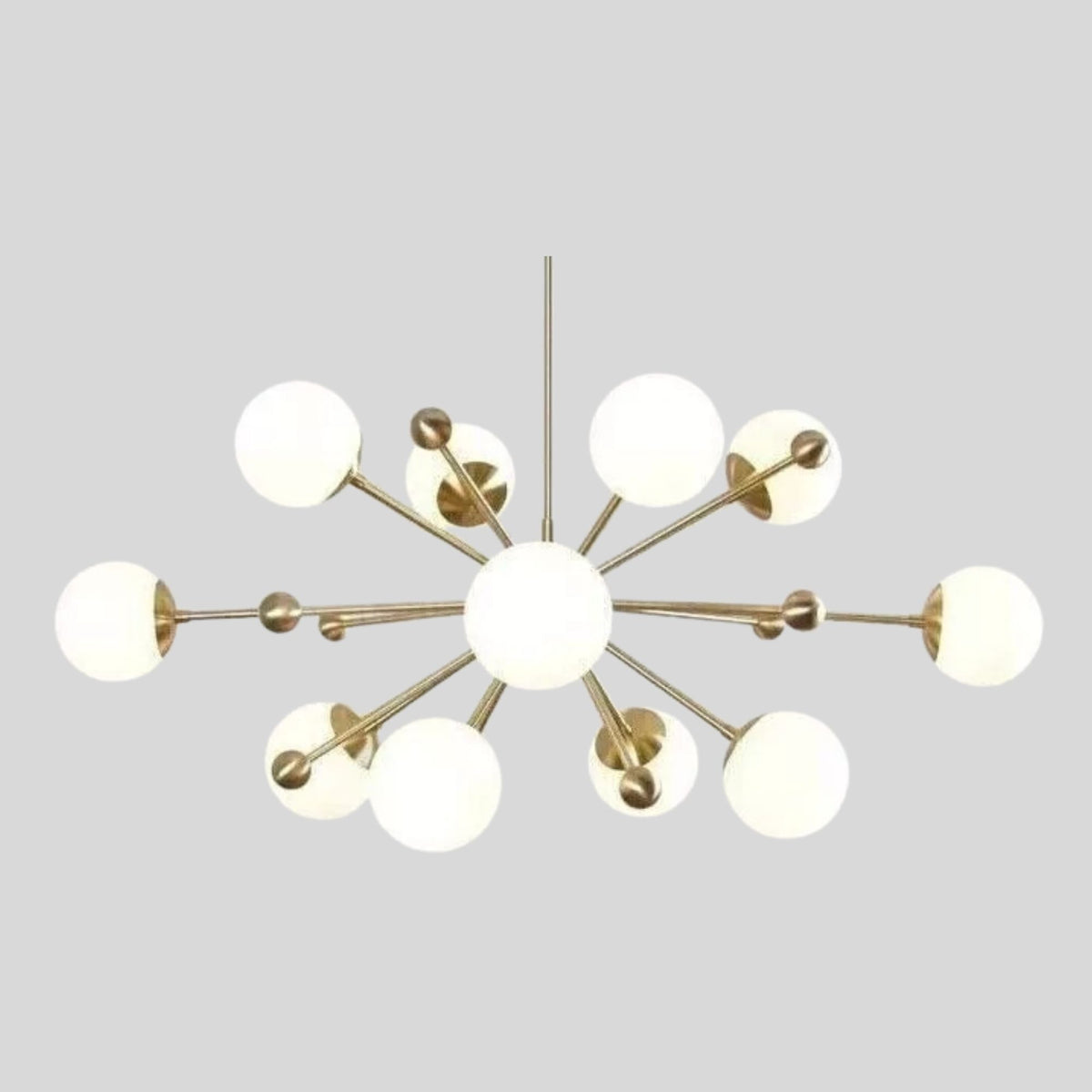 Tallinn 12 light brass-tone globe chandelier shown without canopy, highlighting its radial multi-arm design and white globe shades.