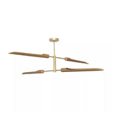 Taormina 4 light brass-tone chandelier shown from a side profile highlighting its slim sculptural shades and horizontal arrangement.