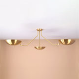 Handmade 3-arm brushed brass flushmount ceiling light with bowl shades and minimalist geometric design by Brass Leaf Studio