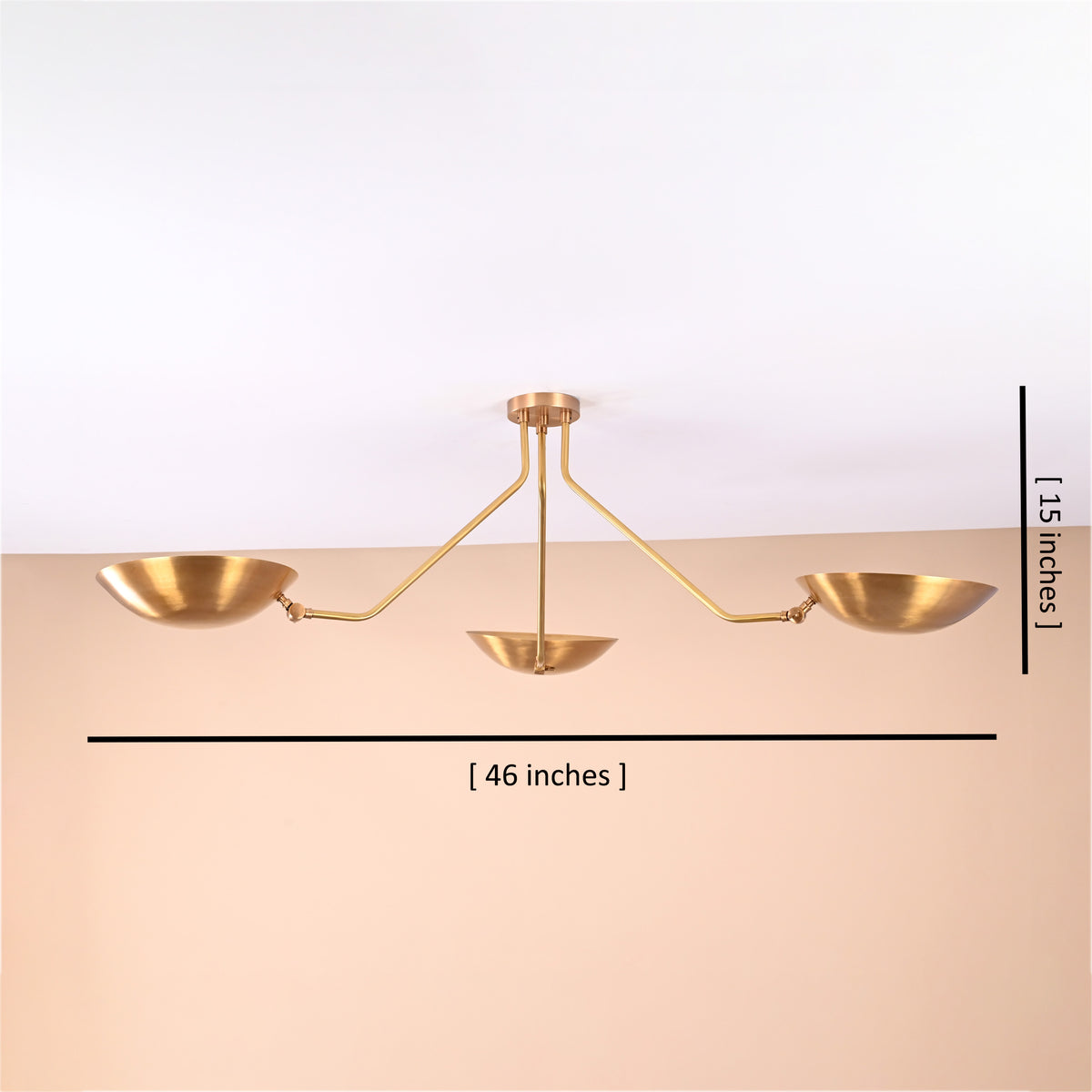 Modern brass flushmount chandelier showing 46-inch width and 15-inch height, minimalist ceiling light