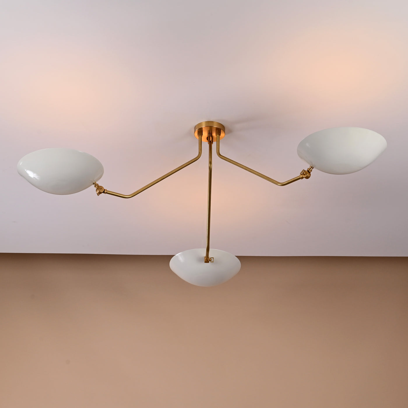 Three-light brass chandelier with white bowl shades, modern flushmount ceiling light by Brass Leaf Studio
