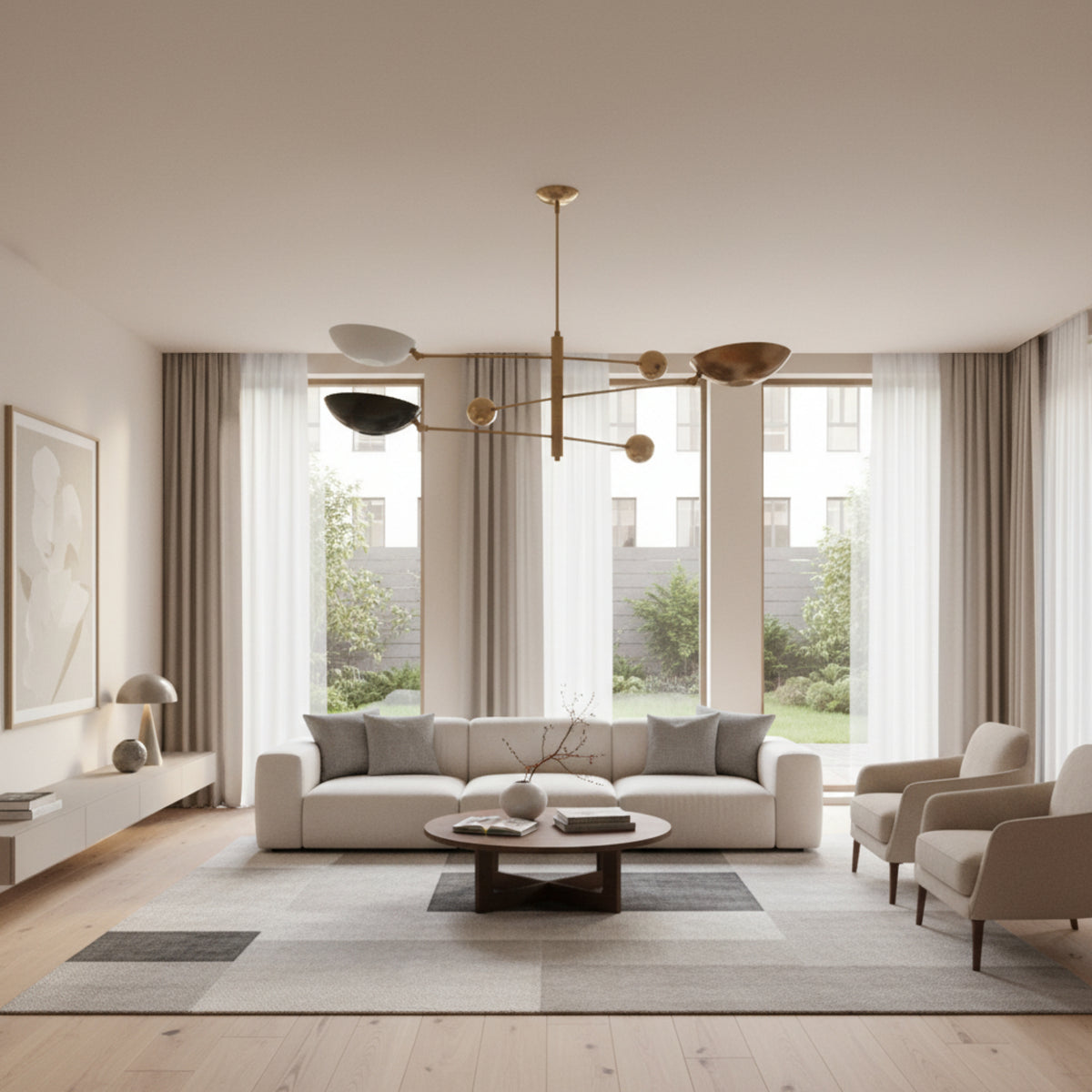 Tokyo 3 light counterbalance chandelier shown from an angled view with sculptural bowl shades, brass-tone arms, and spherical counterweights.