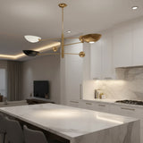 Tokyo 3 light sculptural counterbalance chandelier featuring white, black, and brass-tone bowl shades with slender brass-tone arms.
