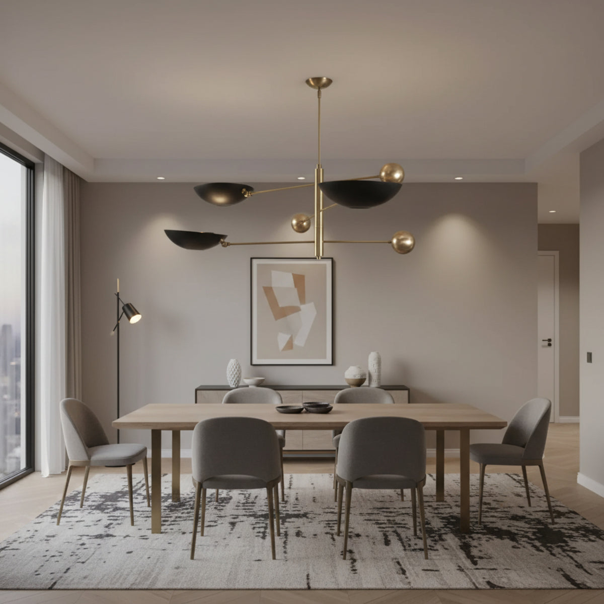 Tokyo 3 light counterbalance chandelier shown from a side angle highlighting its bowl shades, spherical weights, and asymmetrical brass-tone frame.