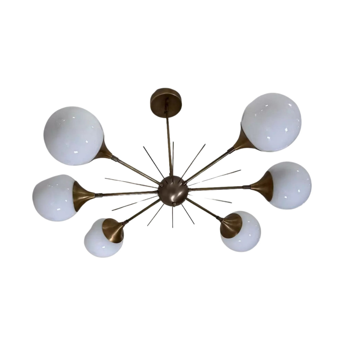 Toledo 6 light Mid-Century Modern chandelier shown from an angled view highlighting its opal globes, radial arms, and starburst details.