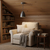 Turin 1 light dark metal perforated cone pendant shown from an angled view with round ceiling canopy and straight downrod.