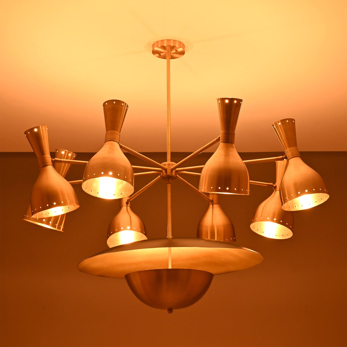 Venice Bottle Disc Chandelier installed on ceiling with illuminated bottle shades and warm ambient lighting.