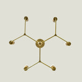 Venice 6 light Mid-Century Modern chandelier shown from below highlighting the geometric arm arrangement and brass-tone construction.
