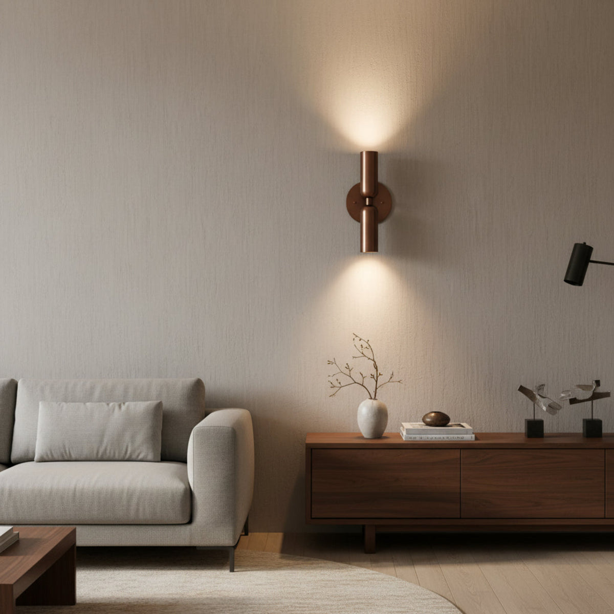 Verona double cylinder wall sconce in warm bronze finish with vertical two-light design, Model 32833.