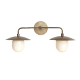 Straight front view of the Verona dual dome vanity wall light with handcrafted metal shades, opal glass globes, and a warm aged brass finish.