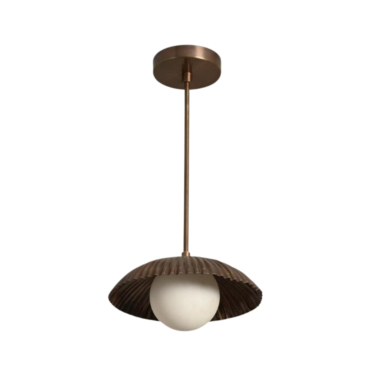 Angled perspective of the Verona Fluted Dome Pendant Light showcasing its fluted dome silhouette, frosted globe light, and minimalist suspended design.