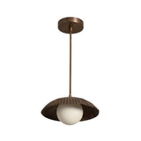Angled perspective of the Verona Fluted Dome Pendant Light showcasing its fluted dome silhouette, frosted globe light, and minimalist suspended design.