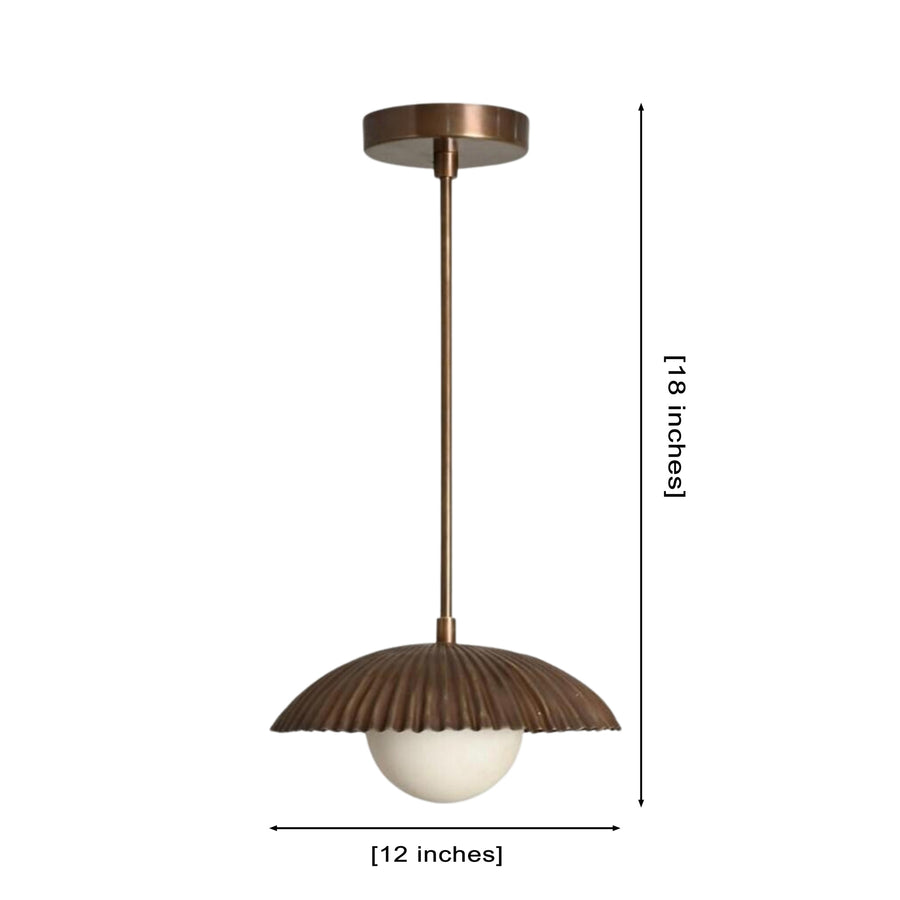 Verona Fluted Dome Pendant Light installed above a kitchen island in a warm contemporary kitchen, featuring a ribbed metal dome shade with a frosted globe diffuser providing soft ambient illumination.