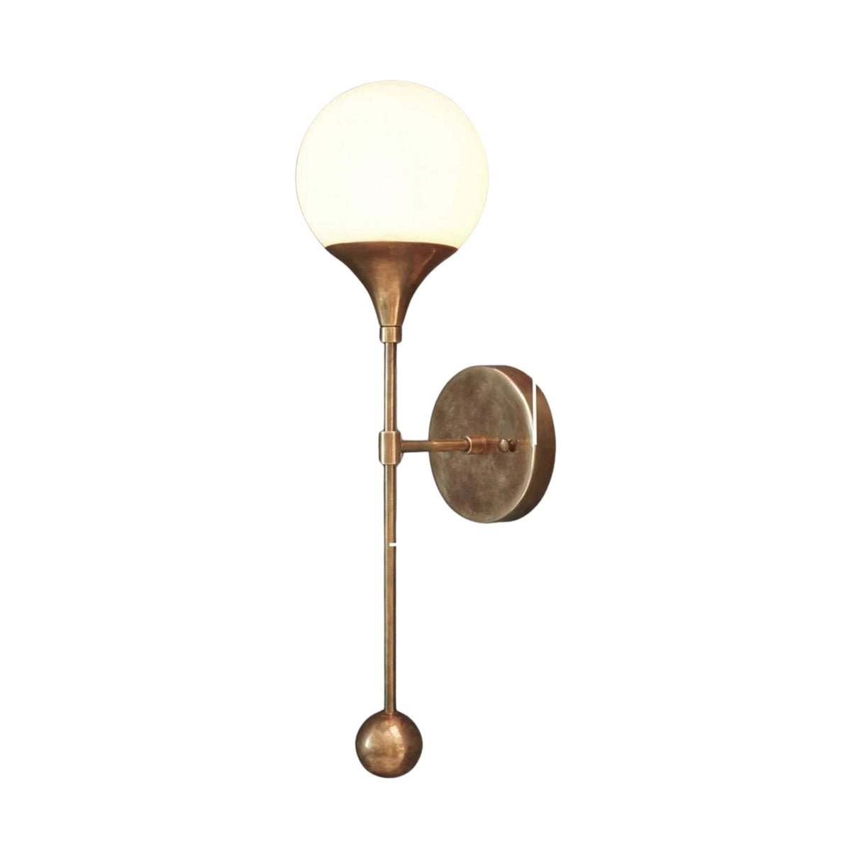 Side profile of the Verona Globe Glass Wall Sconce displaying its slim brass arm, decorative finial, and opal glass globe.