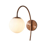 Verona Modern Globe Glass Wall Sconce in antique copper finish featuring a frosted opal glass globe and decorative curved wall arm.