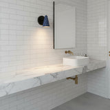 Angled unlit view of Verona perforated blue cone wall sconce with black round wall canopy, Model 32792.