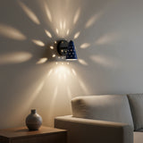 Front view of Verona 1 light perforated cone wall sconce with blue shade and black round canopy, Model 32792.