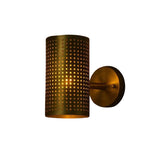 Verona 6 inch perforated brass cylinder wall sconce shown illuminated with warm ambient light, Model 32783.