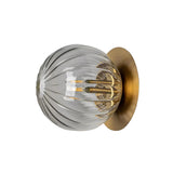 Close-up of Verona ribbed clear glass globe flush mount with brass detailing and single light – Model 32777