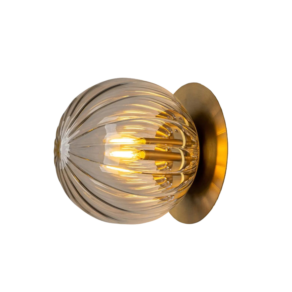 Verona 1-light ribbed glass globe flush mount illuminated with warm ambient light and brass finish – Model 32777