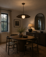 Verona 18 inch aged brass petal pendant chandelier illuminated above a round dining table in a warm modern dining room – Model 33195