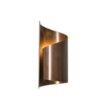 Verona sculptural metal wall sconce featuring a curved wrap shade in warm brass finish