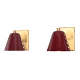 Angled front view of the Verona Studded Cone Wall Sconce showcasing a handcrafted burgundy cone shade, brass stud detailing, and rectangular solid brass backplate.