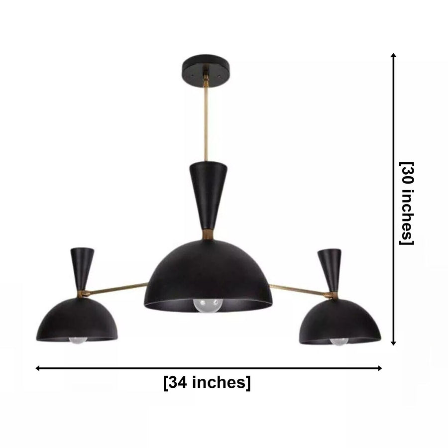 Verona 3 light black and brass dome chandelier illuminated in a warm modern living room interior.