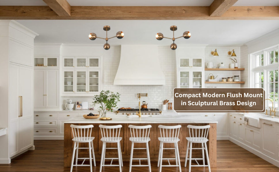 Ambient brass chandelier casting warm light on ceiling in a modern interior