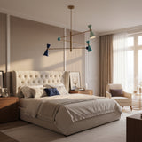 Wellington 3 light counterbalance chandelier shown illuminated from an angled view with colorful cone shades and spherical accents.