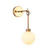 Front view of the Windsor Modern Brass Globe Wall Sconce with a glowing frosted opal glass globe, decorative brass ring suspension, and sleek round wall canopy.