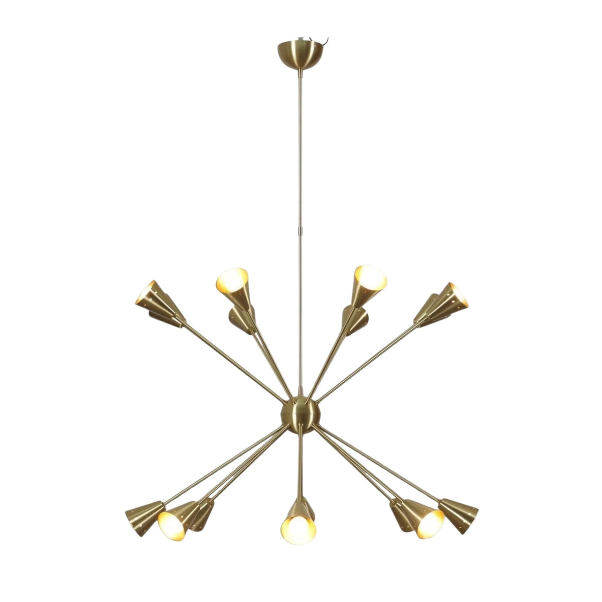 York 16 light brass starburst chandelier illuminated from the front with warm glowing cone shades.